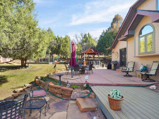 Enjoy outdoor living at its finest in this stunning property! This home features a spacious patio, perfect for entertaining or relaxing.