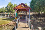 Discover the charm of this unique property featuring a beautifully crafted gazebo, perfect for outdoor relaxation and entertaining.