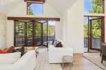 Experience luxury living in this stunning property featuring expansive windows that flood the space with natural light.