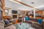 Experience luxury living in this stunning property featuring a cozy fireplace, perfect for chilly evenings.