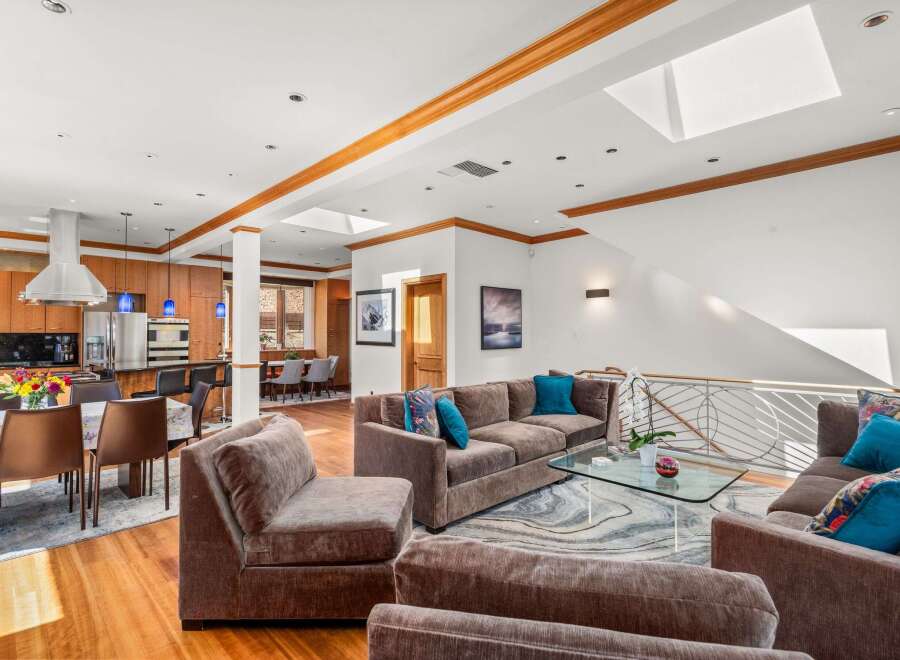 This stunning property boasts a spacious open-concept living area, perfect for entertaining.
