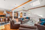 This stunning property boasts a spacious open-concept living area, perfect for entertaining.