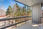 Enjoy breathtaking views from this stunning balcony overlooking a lush landscape.