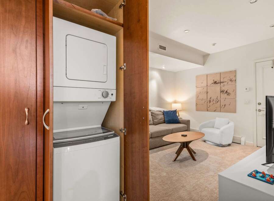 Discover the convenience of in-unit laundry with this stunning property! This home features a modern stacked washer and dryer, making laundry day a breeze.