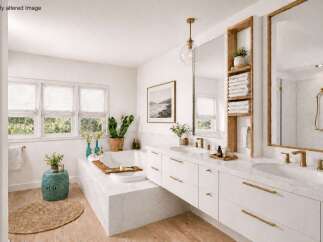 This luxurious bathroom boasts a modern design with a freestanding bathtub, double vanity, and ample natural light.