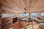 Experience luxury living in this stunning chalet, featuring exquisite wooden interiors and breathtaking mountain views.