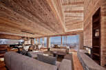 Experience luxury living in this stunning chalet, featuring exquisite wooden interiors and breathtaking mountain views.