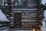 Experience the charm of this cozy log cabin nestled in a winter wonderland.