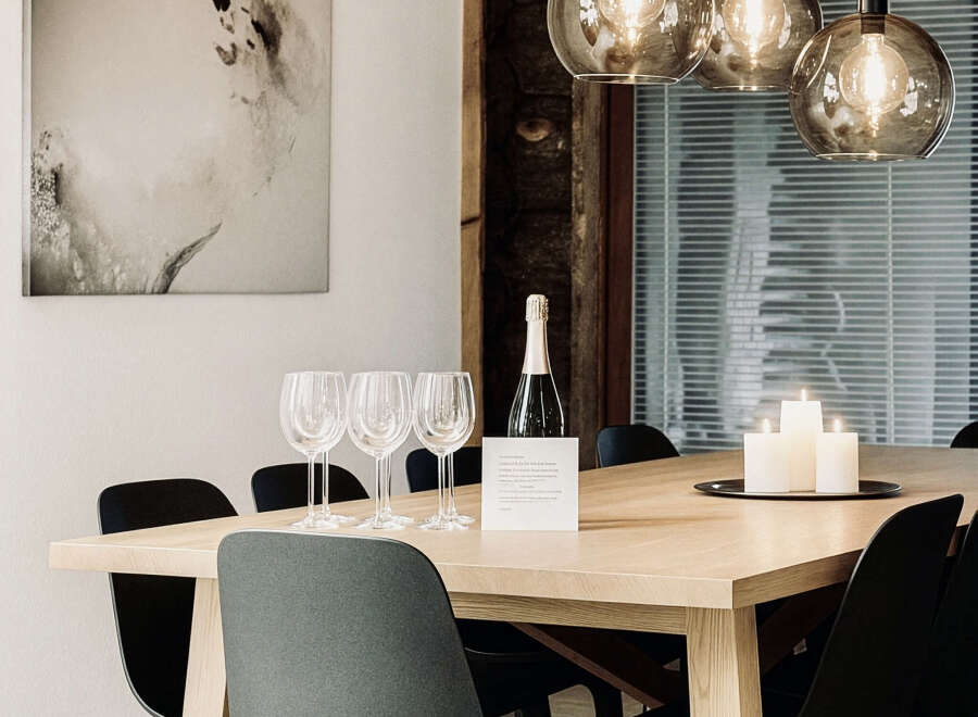 This dining area exudes modern elegance with its minimalist design and natural wood elements.