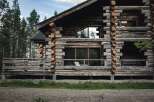 Discover the charm of this stunning log cabin nestled in a serene natural setting.