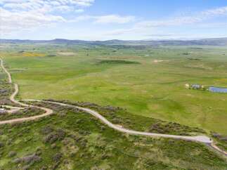 Discover the tranquility of this expansive property, perfect for building your dream home or a serene retreat.