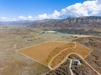 Discover the perfect canvas for your dream home on this expansive parcel of land.
