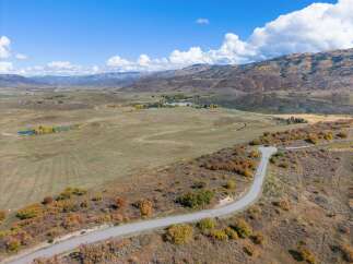Discover the epitome of luxury living in this stunning property, offering breathtaking views of the surrounding mountains and serene landscapes.