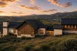 Experience luxury living in this stunning modern home nestled in a picturesque landscape.