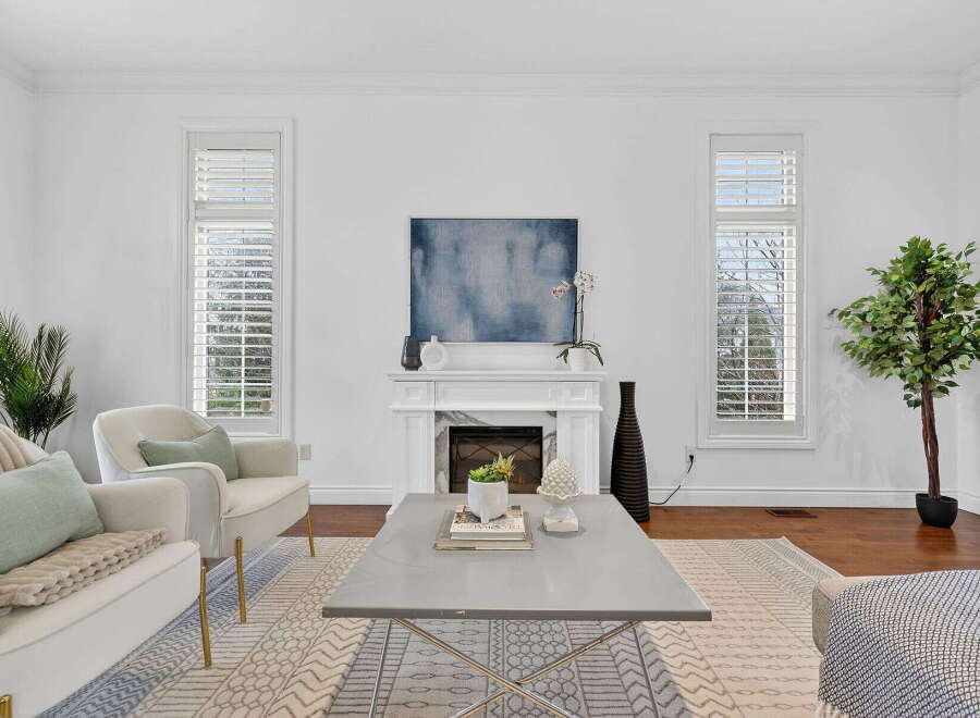This stunning living room boasts a bright and airy atmosphere, perfect for relaxation and entertaining.