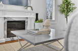 This stunning property boasts a modern fireplace, perfect for cozy evenings.