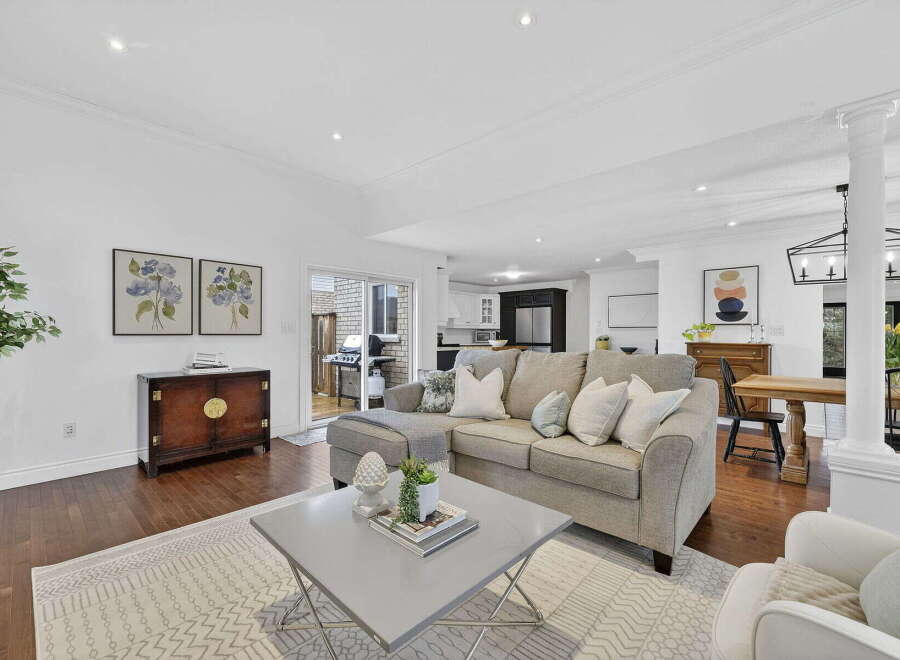 Step into luxury with this stunning property, featuring a spacious living area perfect for entertaining.