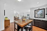 This stunning kitchen boasts a spacious layout, perfect for both cooking and entertaining.