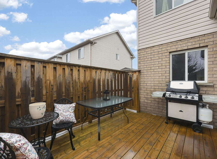 Enjoy outdoor living in this charming backyard space.