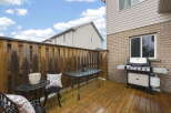 Enjoy outdoor living in this charming backyard space.