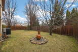 Enjoy the tranquility of this spacious backyard, perfect for relaxation and outdoor gatherings.