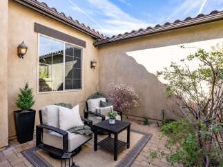 Discover the charm of this inviting outdoor patio space, perfect for relaxation and entertaining.