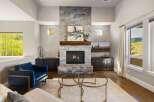 Experience luxury living in this stunning property featuring a modern fireplace, perfect for cozy evenings.