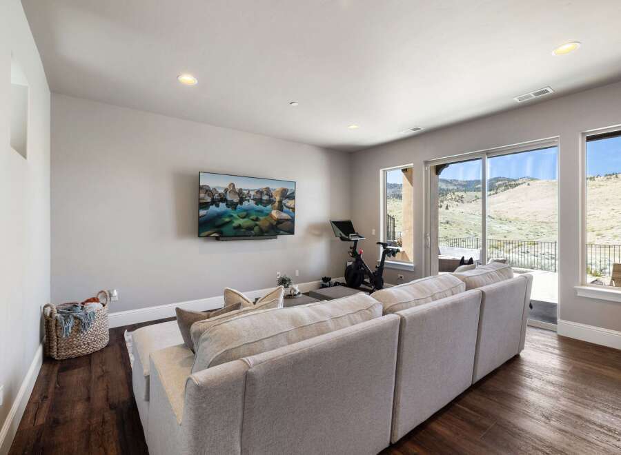 Experience luxury living in this stunning property! This home features a spacious living area with a modern design, perfect for relaxation and entertainment.