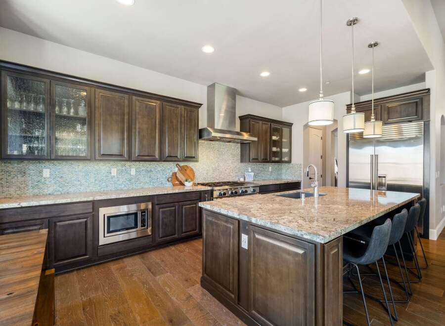 This stunning kitchen boasts a modern design with high-end finishes.