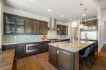 This stunning kitchen boasts a modern design with high-end finishes.