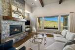 Experience luxury living in this stunning property featuring a cozy fireplace, perfect for chilly evenings.