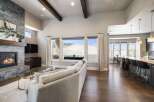 Experience luxury living in this stunning property featuring a cozy fireplace and a spacious living area.