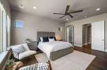 Step into luxury with this stunning bedroom, featuring a spacious layout and elegant design.
