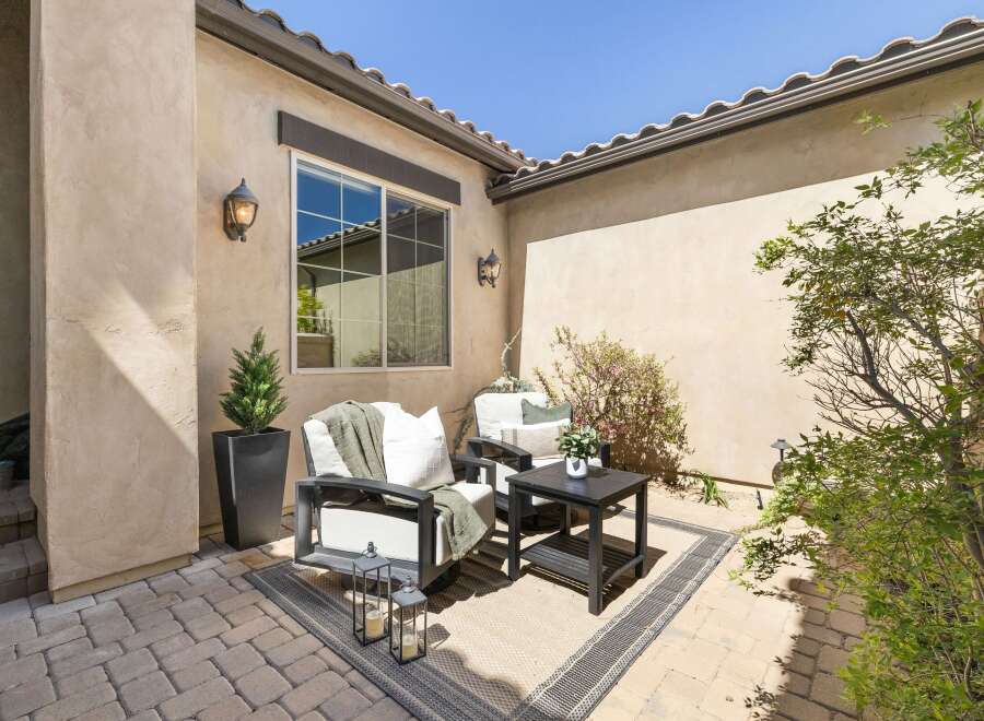 Enjoy the tranquility of this outdoor patio space, perfect for relaxation and entertaining.