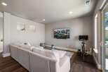 This stunning property boasts a modern living space, perfect for relaxation and entertainment.