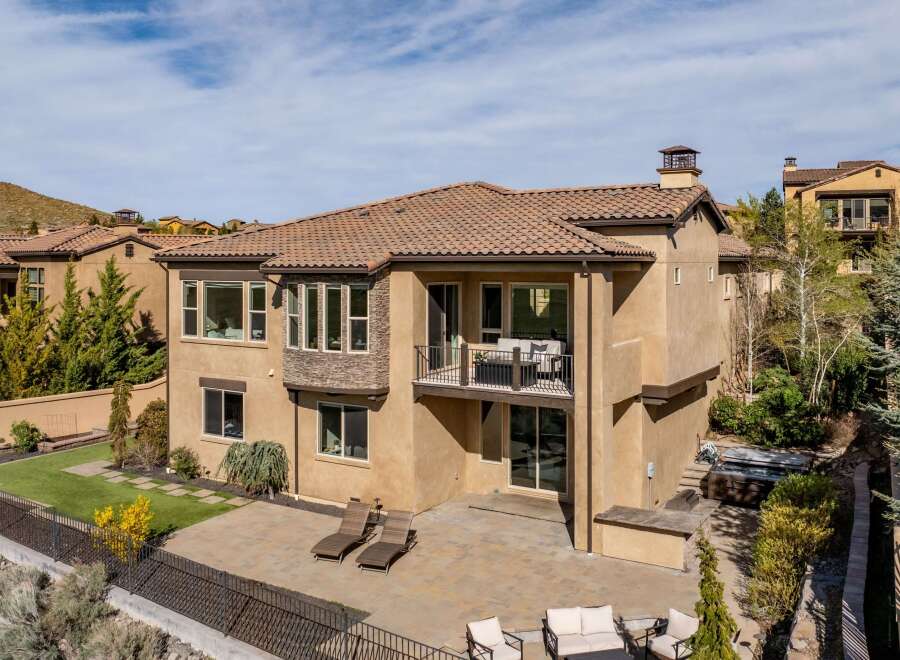 This stunning property boasts a luxurious outdoor space, perfect for entertaining or relaxing.