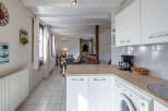 This charming property boasts a bright and airy kitchen with modern appliances and ample counter space.