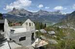 Discover a stunning property under construction, offering breathtaking mountain views.