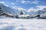 Escape to a winter wonderland with this charming property nestled in the heart of the mountains.