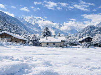 Escape to a winter wonderland with this charming property nestled in the heart of the mountains.