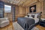 Experience the ultimate in alpine luxury with this stunning bedroom.