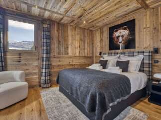 Experience the ultimate in alpine luxury with this stunning bedroom.
