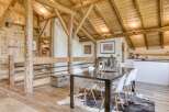 Experience rustic elegance in this stunning property, featuring exposed wooden beams and a warm, inviting atmosphere.