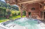 Enjoy the ultimate relaxation in this stunning property featuring a luxurious hot tub.