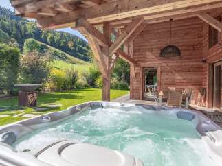 Enjoy the ultimate relaxation in this stunning property featuring a luxurious hot tub.