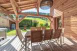 Enjoy the tranquility of this stunning outdoor dining area, perfect for entertaining or relaxing.
