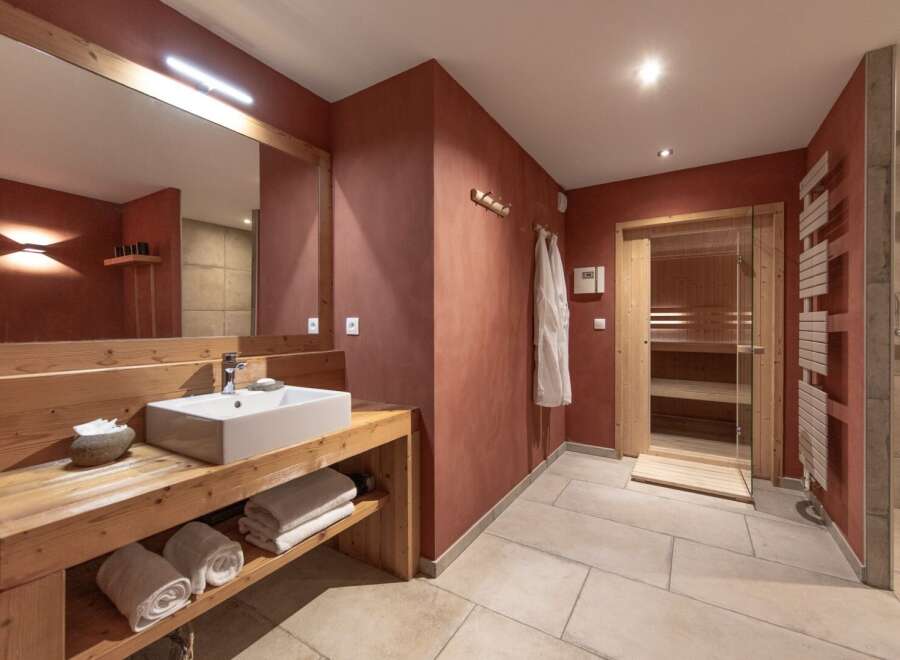 Step into luxury with this stunning bathroom featuring a modern design and spa-like amenities.