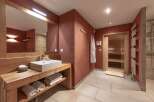 Step into luxury with this stunning bathroom featuring a modern design and spa-like amenities.