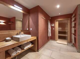 Step into luxury with this stunning bathroom featuring a modern design and spa-like amenities.