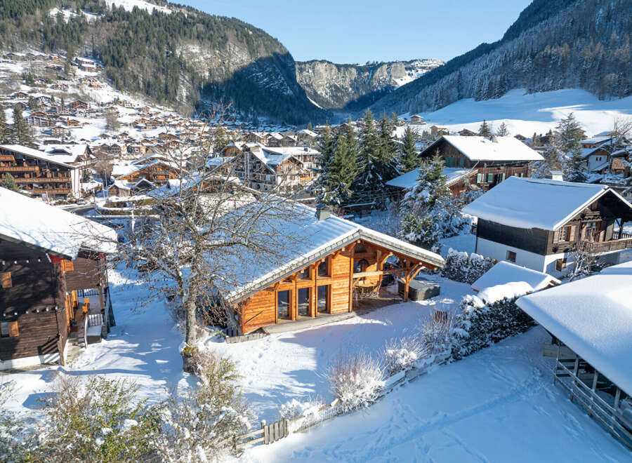 Discover the charm of this stunning chalet nestled in a picturesque winter wonderland.